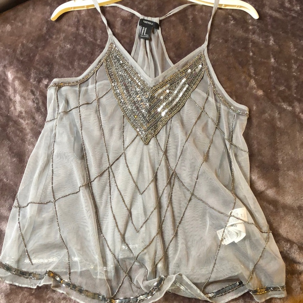 Median grey sleeve less blouse